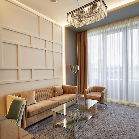 Aghababyan'S Hotel Jerevan Exteriör bild A living room in a suite at the hotel